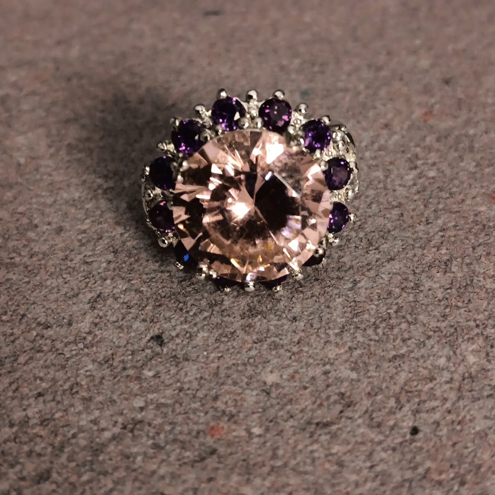 PINK AND PURPLE STONES. LISTING ONCE APPRAISED.